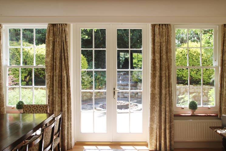 French door and Slimline sash windows alongisde each other in perfect harmony (internal view)