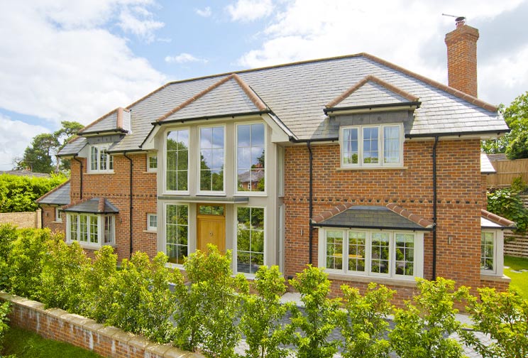 Double story Entrance Hall bathes the house in light