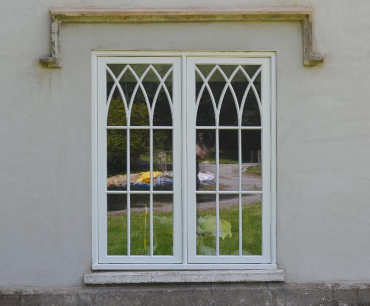 Recessed Cothic casement windows of unusal proportion Recessed Cothic casement windows of unusal proportion